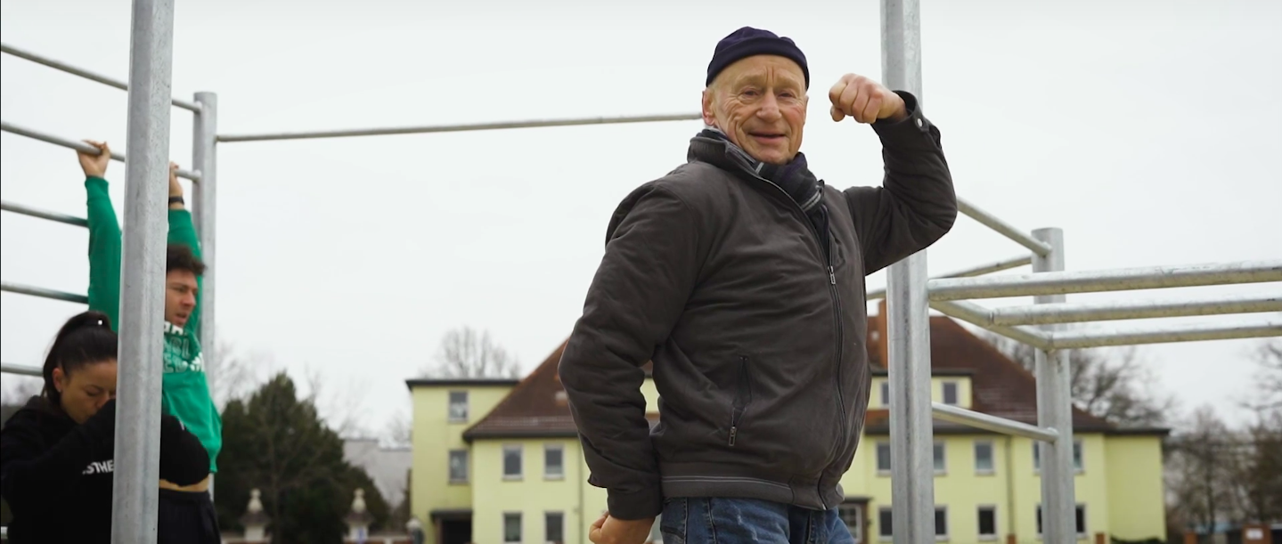 Older gentleman at an outdoor fitness park